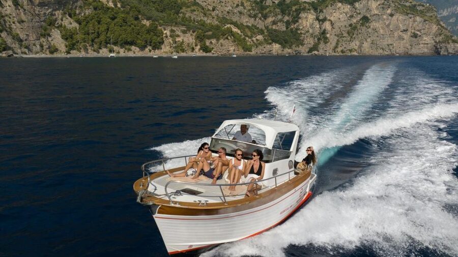 Positano: Boat Tour of Capri with Drinks and Snacks - Leaving Positano from the main beach