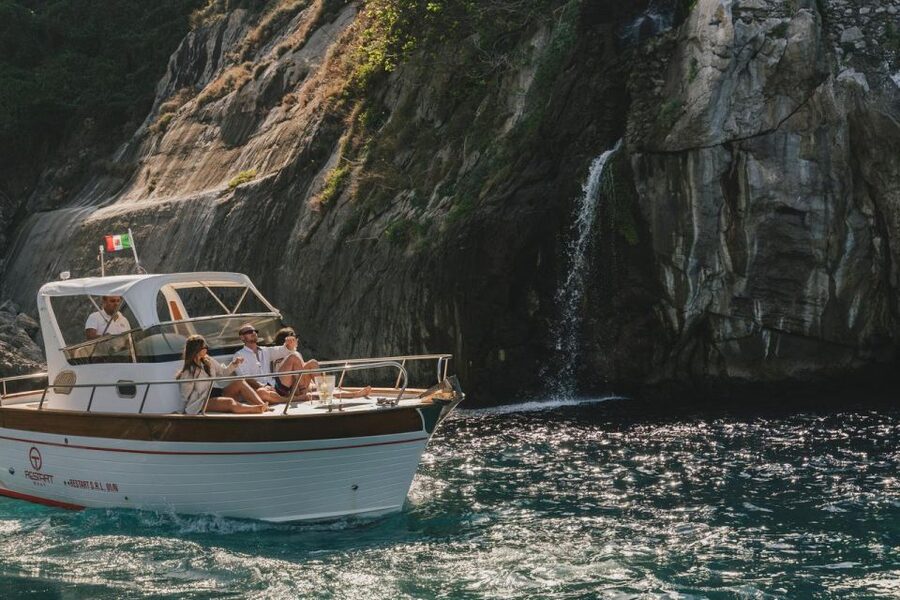 Positano: Boat Tour of Capri with Drinks and Snacks - Choosing between Capri and a swimming stop