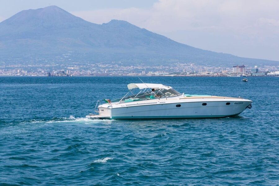 Positano: Boat Tour of Capri with Drinks and Snacks - Lunch by the sea, with a warning about cost