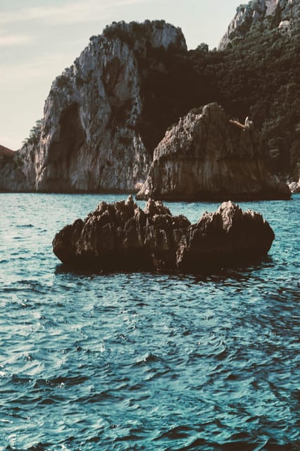 Positano: Capri and Blue Grotto Shared Boat Tour with Drinks - Four free hours on Capri