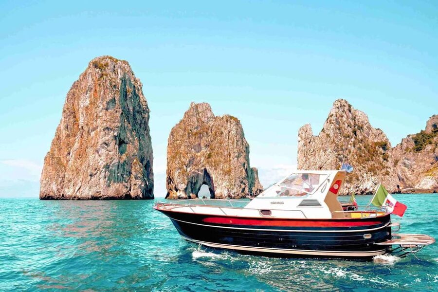 Positano: Capri and Blue Grotto Shared Boat Tour with Drinks - Seeing Capri from the sea