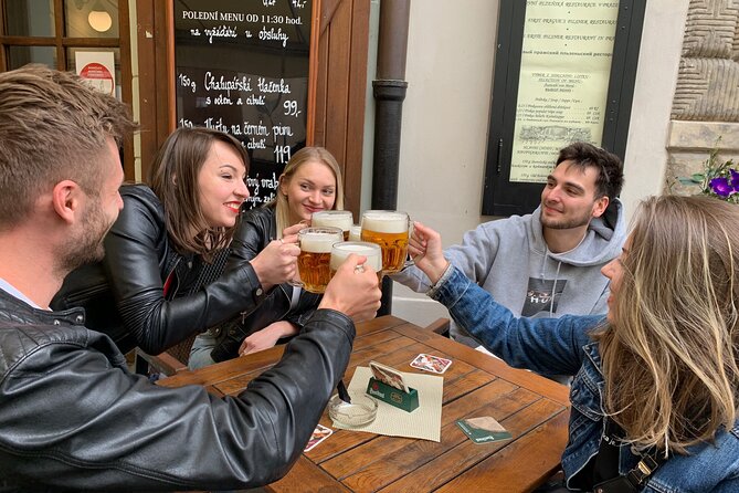 Prague Historic Pub Tour with Drinks Included - Lesser Town: a final drink below Prague Castle