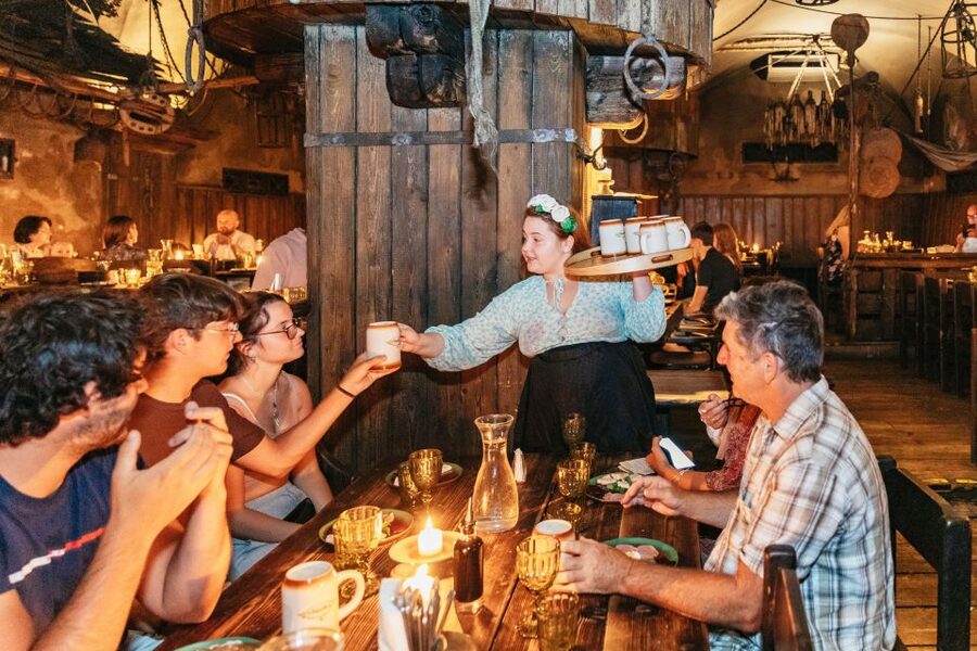 Prague: Medieval Dinner with Unlimited Drinks - The shared-table setup