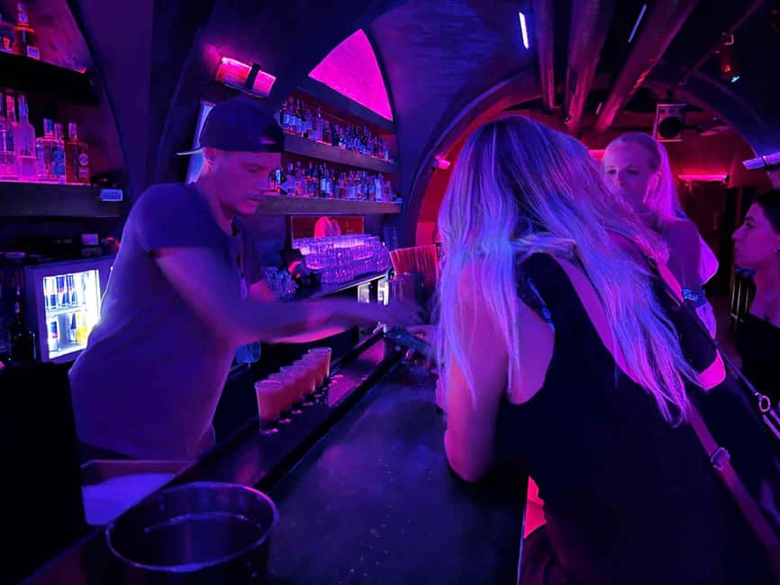 Prague: Pub Crawl with Shots & Entrance to Rooftop Club - Moving through two or three Prague bars
