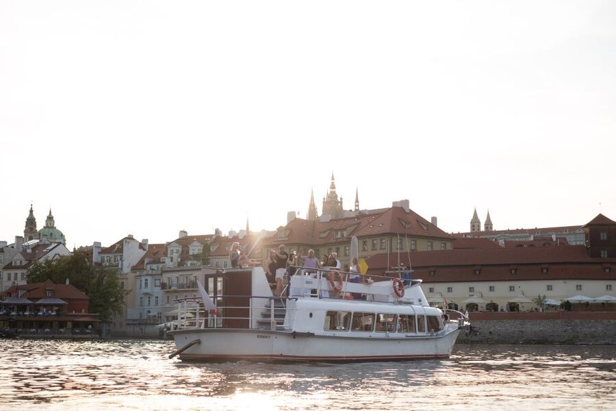 Prague: Vltava River Private Boat Party with Drinks - The National Theatre and Lesser Town riverfront