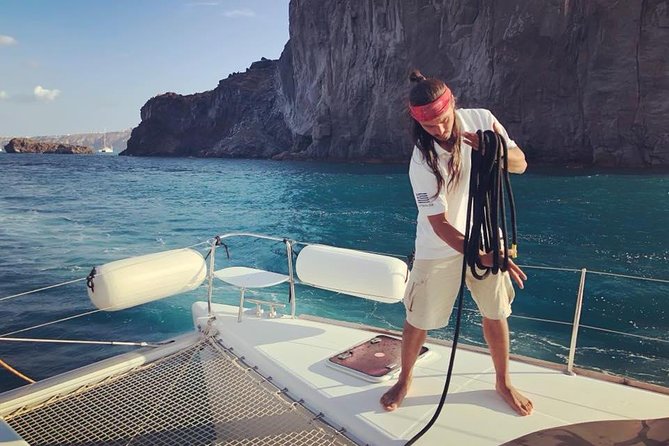 Premium Small-Group Catamaran Cruise with BBQ, Open Bar, Transfer - Thirasia and the Quiet Cove