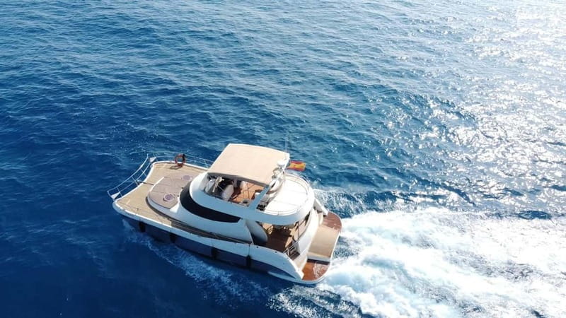 Puerto del Carmen: Private Sunset Catamaran Tour with Drinks - Timing the sunset behind Los Ajaches
