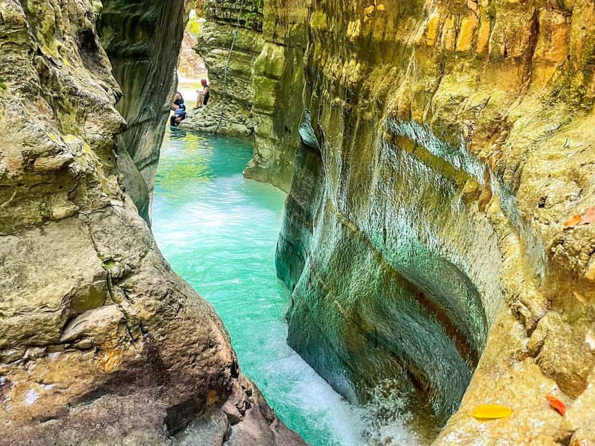 Puerto Plata: Damajagua Waterfalls Canyoning & Cocktail - Swimming, rock slides, and waterfall jumps