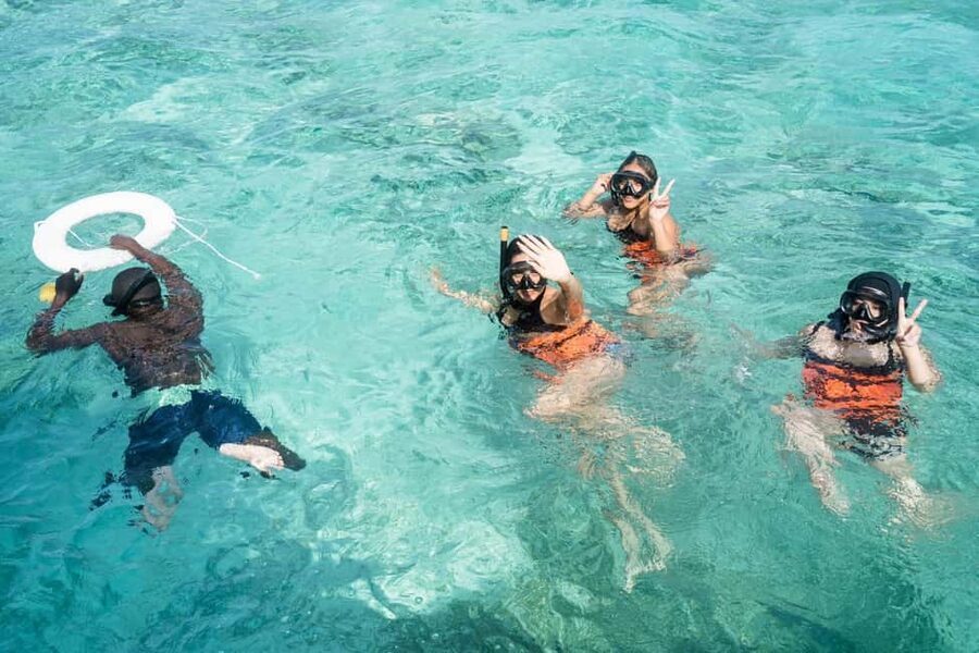 Punta Cana: Catamaran Tour with Reef Snorkeling and Open Bar - Settling aboard a spacious catamaran