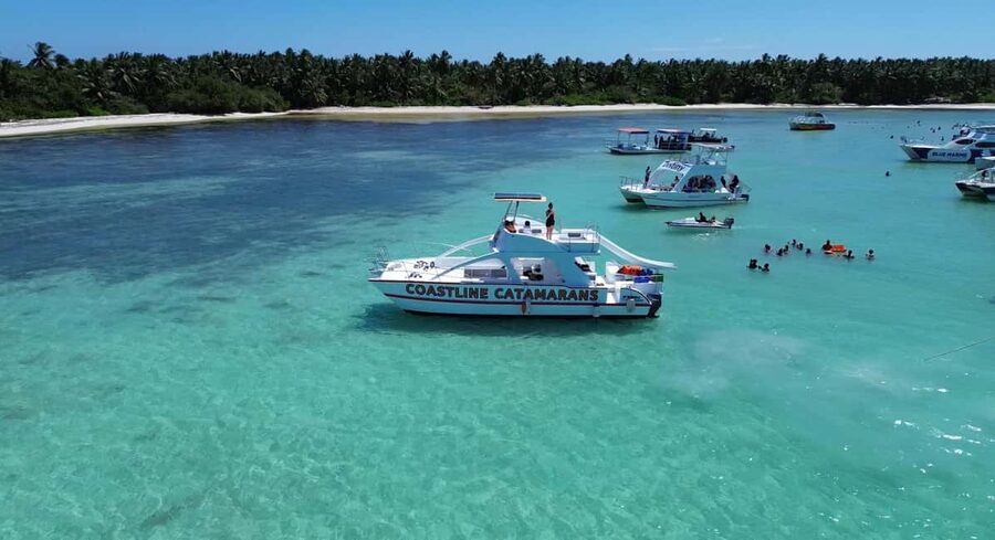 Punta Cana: Catamaran Tour with Reef Snorkeling and Open Bar - The boat slide adds a family-friendly twist