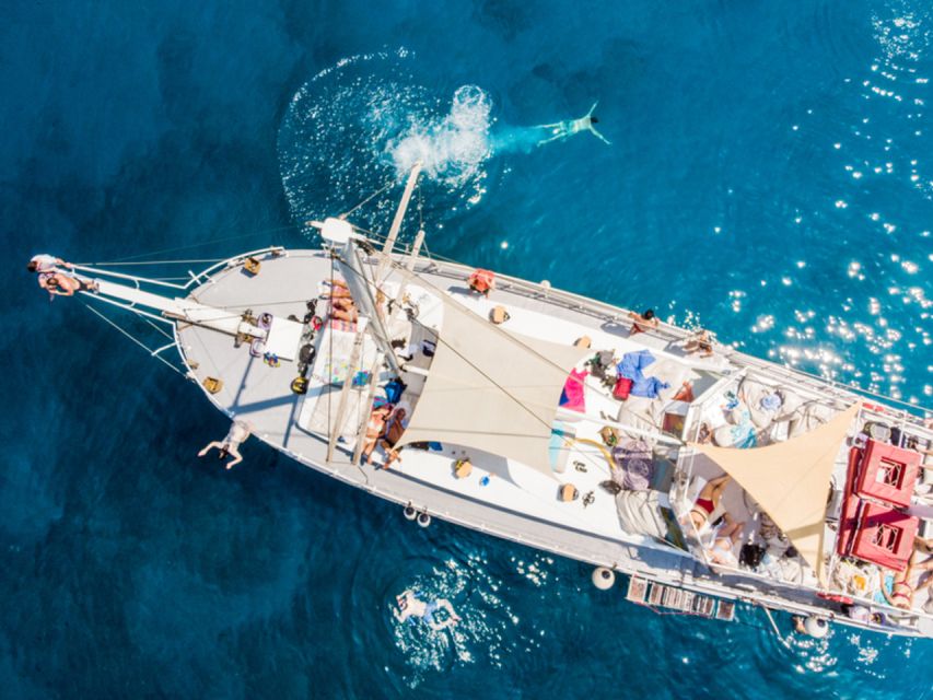 Rhodes: Boat Tour with Snorkeling, Gourmet Buffet & Open Bar - The ride back to Mandraki Port