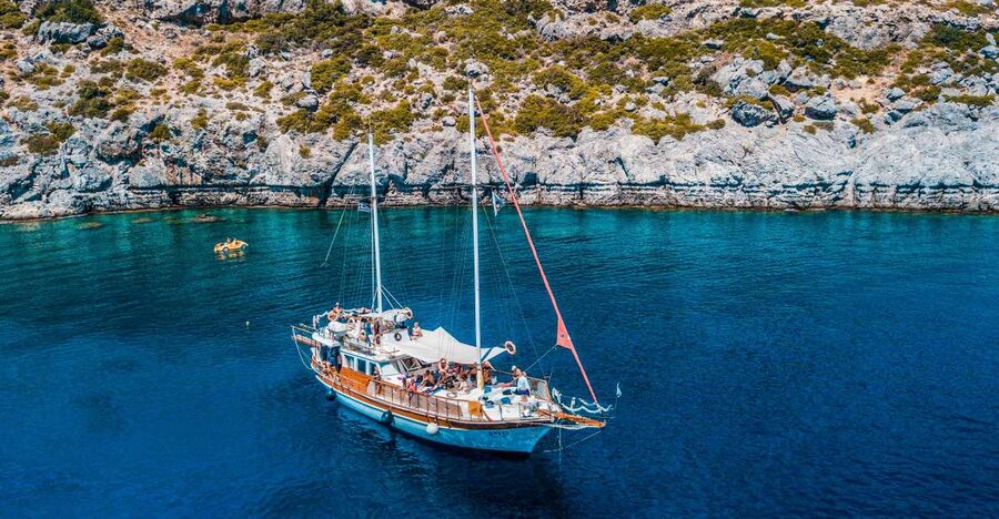 Rhodes: Cruise with 3 Stops, Lunch and Unlimited Drinks - Sailing from Mandraki Port on a wooden boat