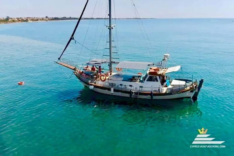 Rhodes: Cruise with 4 Swim Stops, Lunch, Drinks & Transfers - Ladiko Bay and the underwater cliff