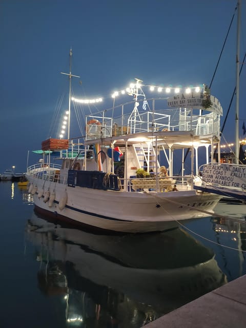 Rhodes: Sunset Cruise to Kallithea with Drinks and Snacks - Drinks, fruit, and snacks without extra charges