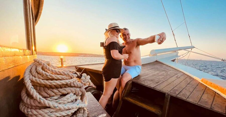 Rhodes: Sunset Cruise with Greek BBQ and Unlimited Drinks - Who should book this cruise?