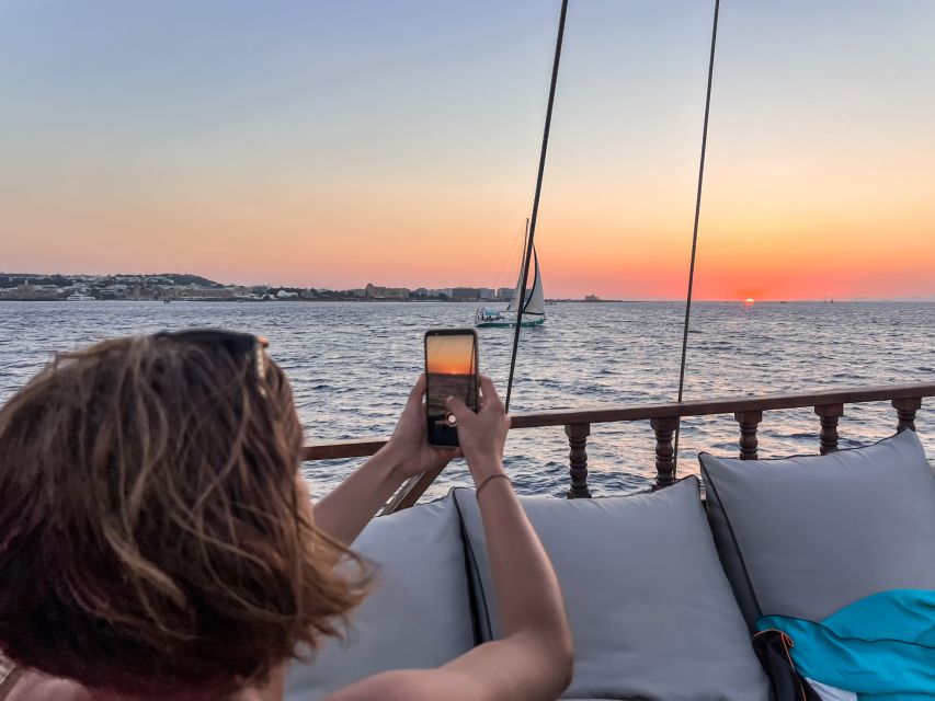 Rhodes: Sunset Cruise with Greek BBQ and Unlimited Drinks - Sunset from the west-facing side of Rhodes