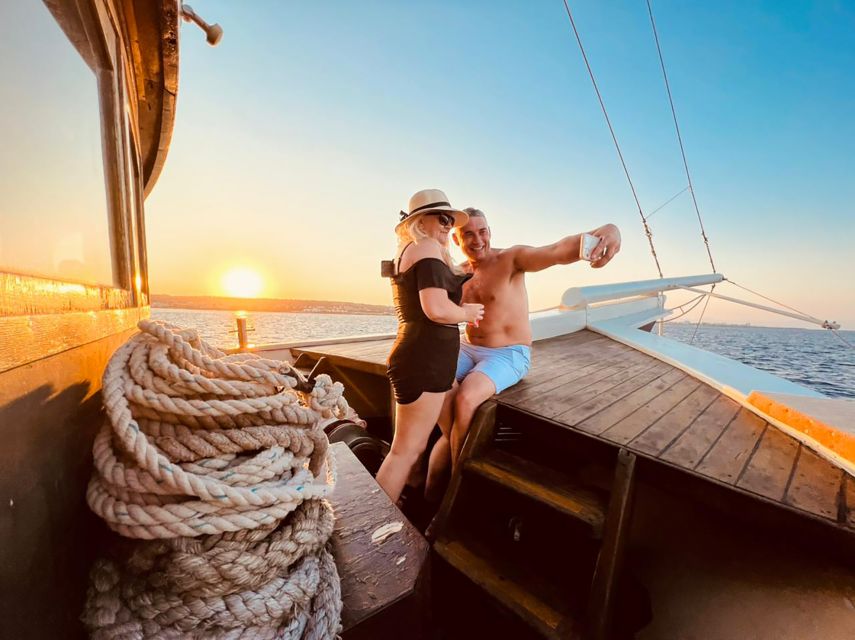 Rhodes: Sunset Cruise with Greek BBQ and Unlimited Drinks - The first 45 minutes: coastal views and a gentle start