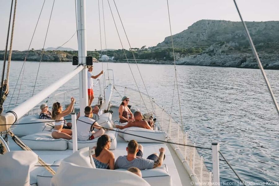 Rhodes: Sunset Cruise with Open Bar, Dinner, & Live Music - Sunset, moonrise, and live music