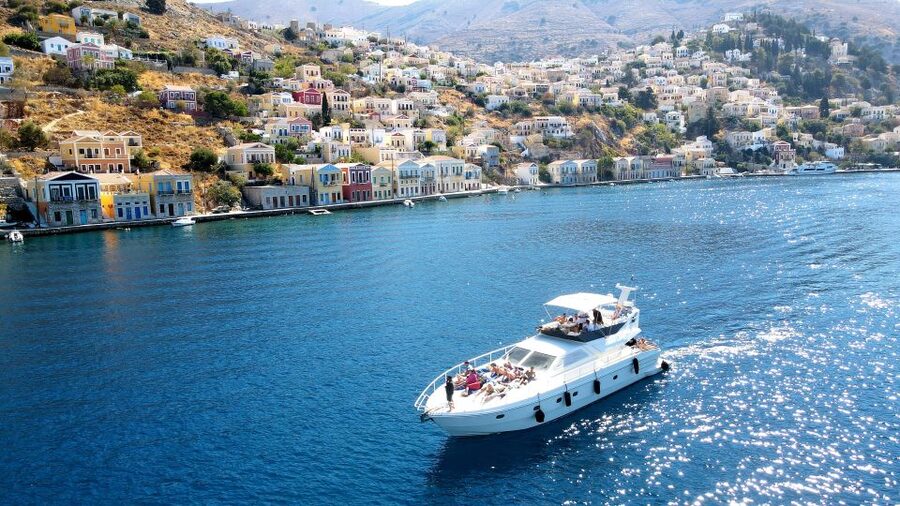 Rhodes: Symi Yacht Tour with Unlimited Drinks and Transfer - Symi Town gives you two useful hours