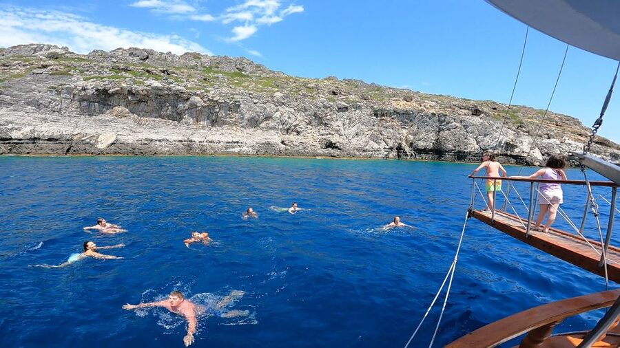 Rhodes Town: Sunset Boat Cruise with Drinks & Snacks - A Rhodes sunset cruise with a proper swim stop