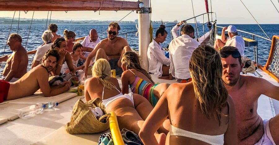 Rhodes Town: Sunset Boat Cruise with Drinks & Snacks - Drinks, snacks, and cocktails on board