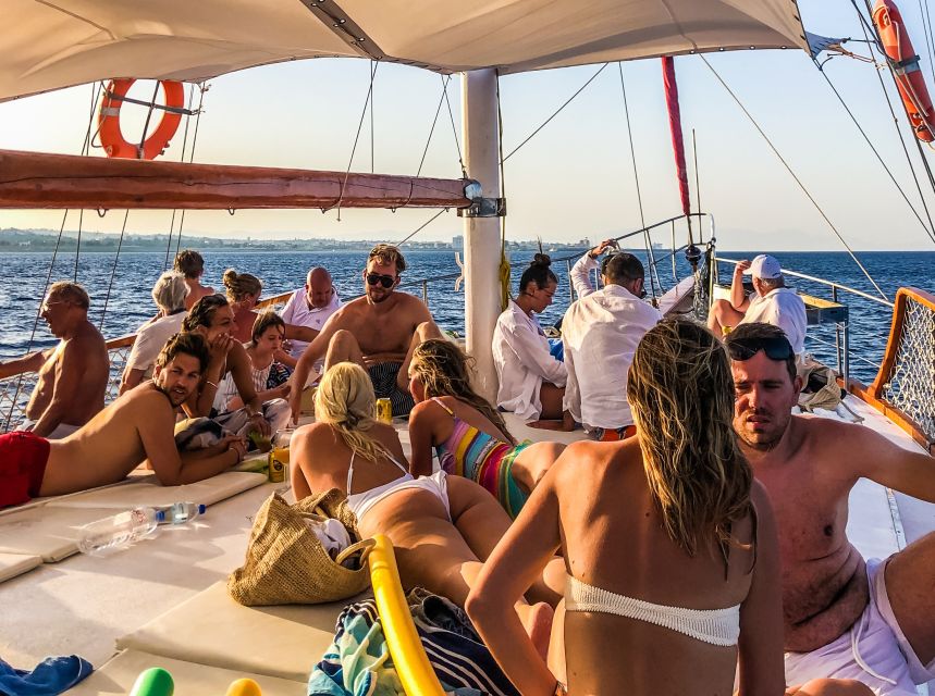 Rhodes Town: Sunset Boat Cruise with Drinks & Snacks - Kallithea Springs: the main swimming stop
