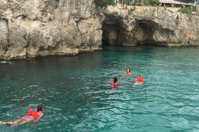 Ricks Cafe Party Cruise with Open Bar & DJ MONTEGO BAY RESORTS - Snorkeling at the coral reef