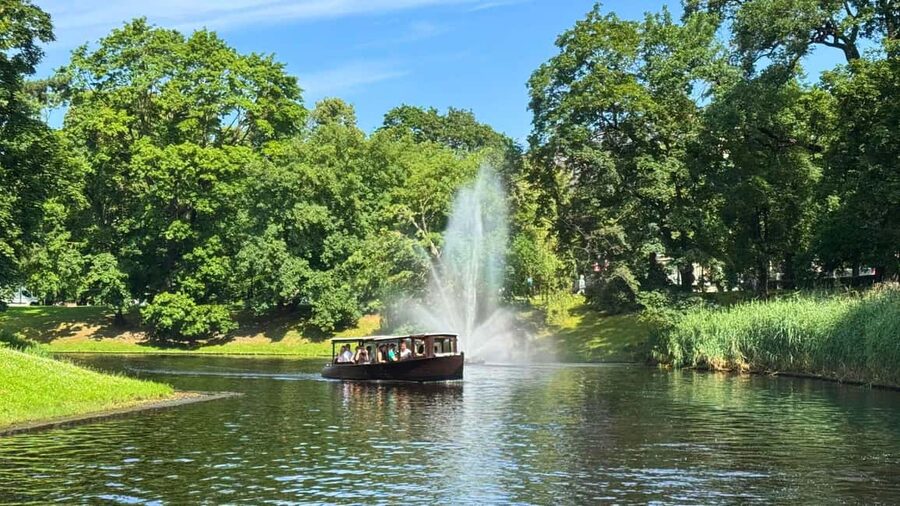 Riga: Canal Boat Tour with Welcome Drink & Audio Guide - Through the Riga Canal and city parks