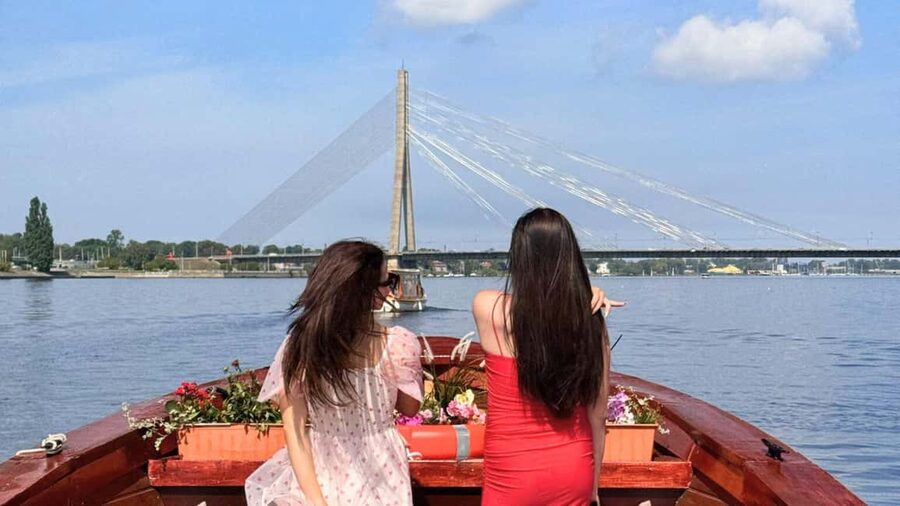 Riga: Canal Boat Tour with Welcome Drink & Audio Guide - Riga Central Market beside the canal