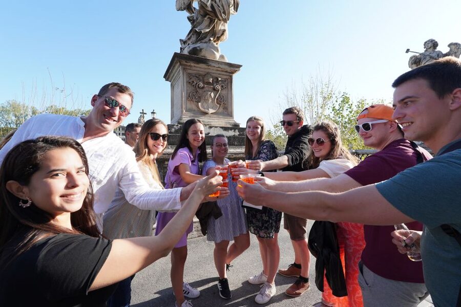Rome: Evening Walking Tour with Cocktails and Local Guide - Crossing Ponte Sant’Angelo for the Vatican view