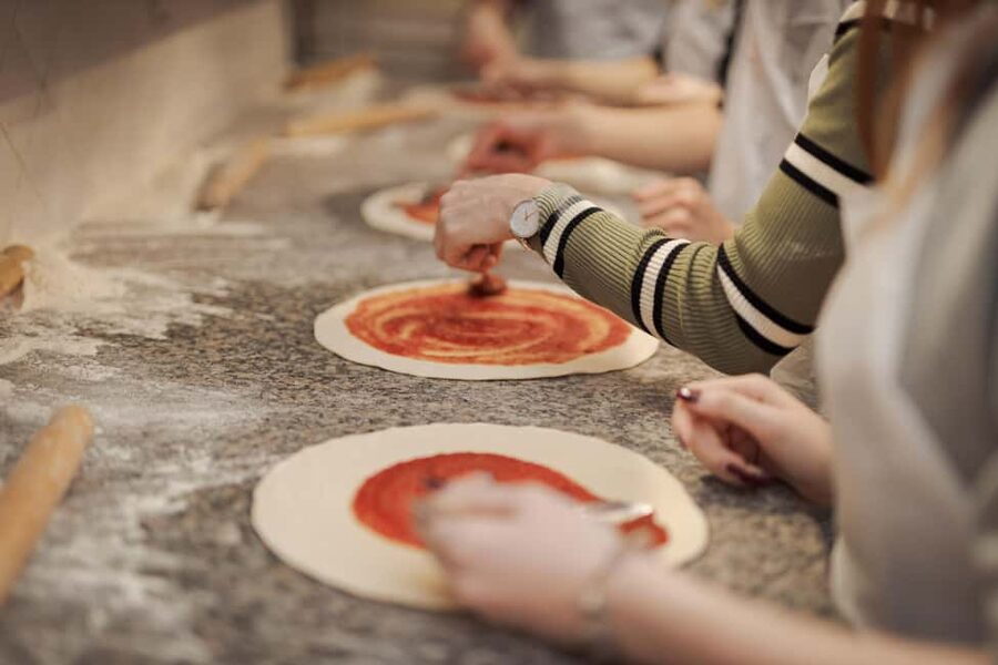 Rome: Pizza Cooking Class in Piazza Navona with Drinks - Making pizza beside Piazza Navona
