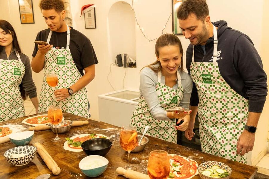 Rome: Pizza Making Cooking Class With Spritz Cocktails - Sitting down to eat your Roman dinner