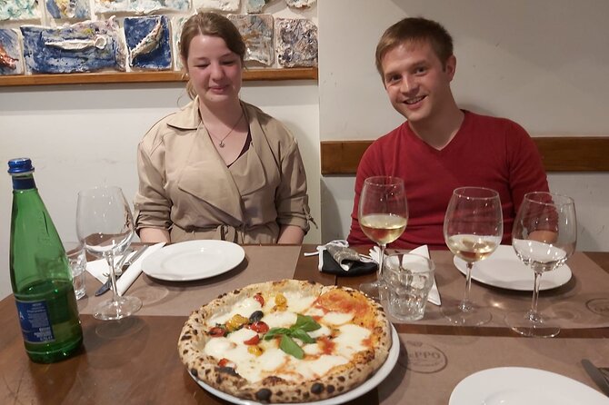 Rome: Pizza & Tiramisu Class with Free Flowing Fine Wine - Working with dough and building Roman pizza