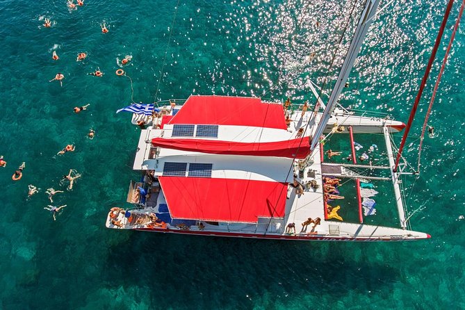 Sailing Catamaran Cruise in Santorini with BBQ, Drinks and Transfer - Setting out from Ammoudi or Athinios Port