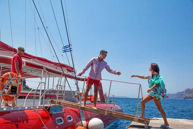 Sailing Catamaran Cruise in Santorini with BBQ, Drinks and Transfer - White Beach, barbecue, and the longest stop