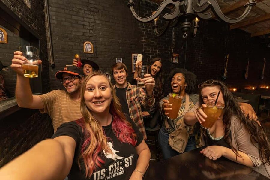 Salem: Boos and Brews Haunted Pub Crawl - Starting at East India Square with a lantern