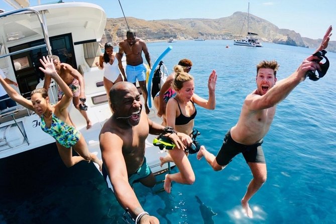 Santorini All-inclusive Catamaran Cruise with Thirassia Stop - White Beach and Red Beach are photo stops, not beach days