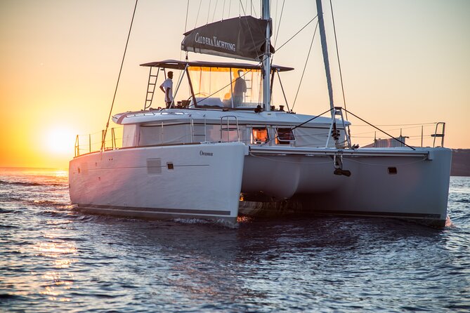 Santorini:All-inclusive Catamaran Cruise with Thirassia Stop - Red Beach and the volcanic south coast