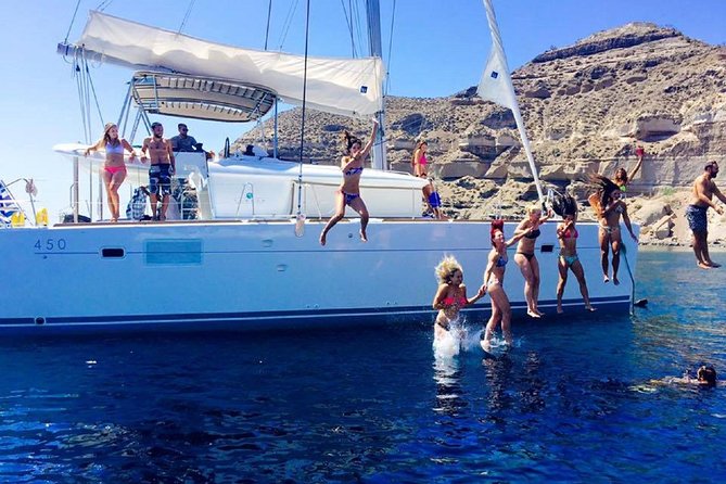 Santorini Catamaran Cruise with Fresh Meal and Open Bar - Sailing around Nea Kameni volcano
