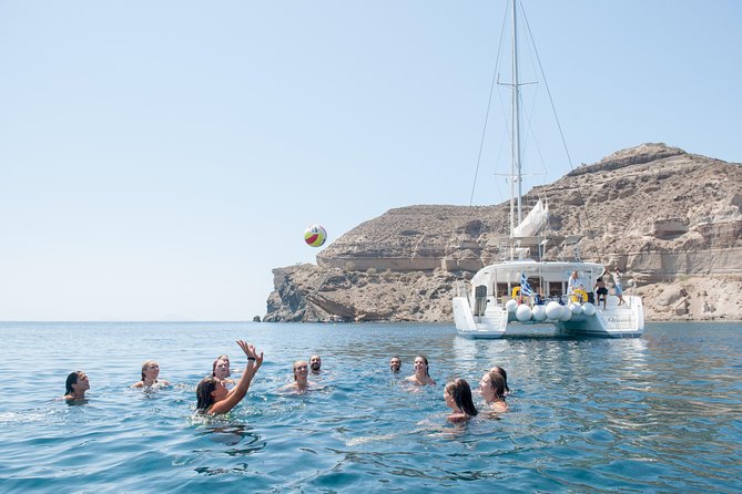 Santorini Catamaran Cruise with Fresh Meal and Open Bar - Sunset departures and the feel onboard