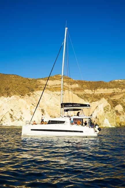 Santorini: Catamaran Cruise with Fresh Meal & Open Bar - Greek food, local drinks, and time on deck