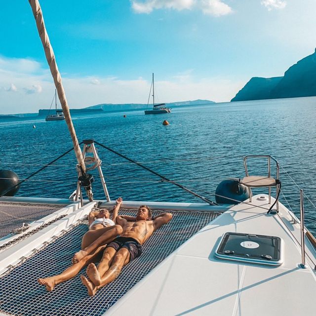 Santorini: Catamaran Cruise with Meal & Open Bar - Warm water at the hot springs
