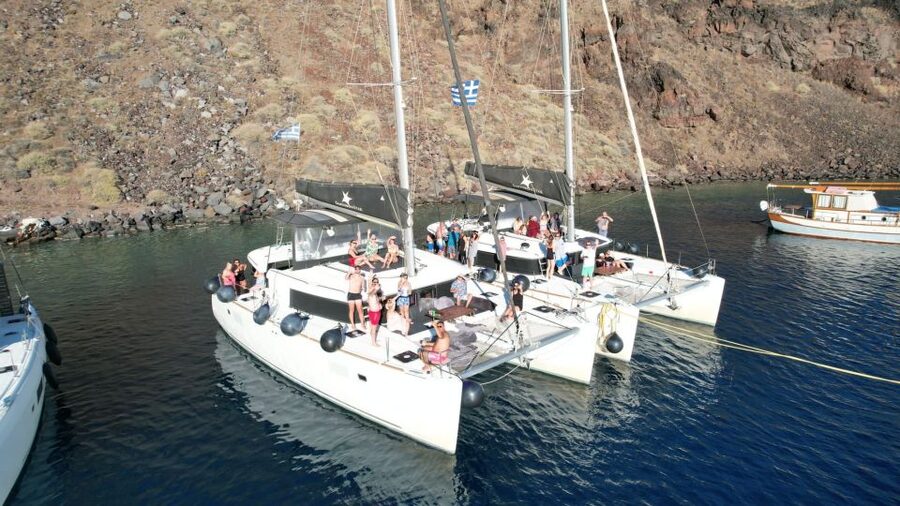 Santorini Catamaran Cruise with Swimming, Meal and Open Bar - Warm water at the Palea Kameni hot springs