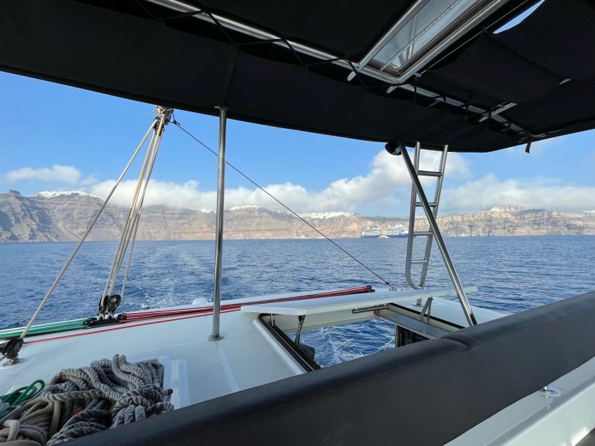 Santorini Catamaran Cruise with Swimming, Meal and Open Bar - Thirassia, snorkeling, and the main meal