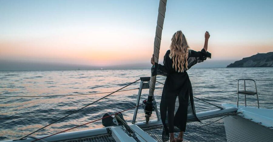 Santorini Catamaran Cruise with Swimming, Meal and Open Bar - Timing, weather, and comfort