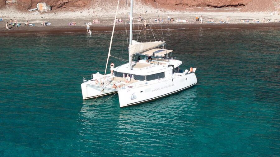Santorini Catamaran Day Cruise: Lunch, Drinks and Transfers - Why seeing Santorini from a catamaran matters