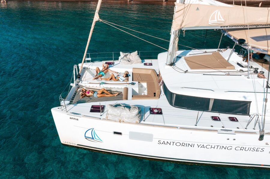 Santorini Catamaran Day Cruise: Lunch, Drinks and Transfers - Red Beach gives you the first swim