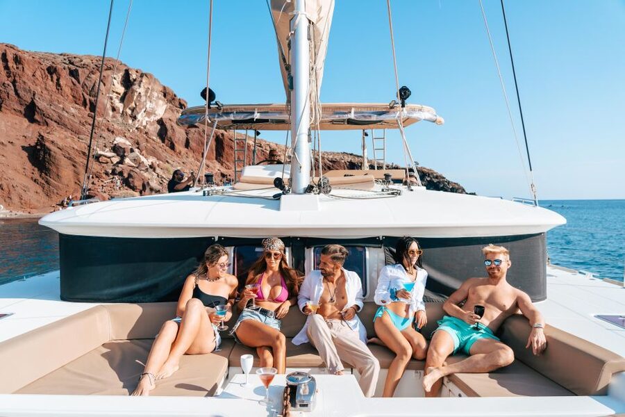 Santorini Catamaran Day Cruise: Lunch, Drinks and Transfers - White Beach, Indian Rocks, and the Venetian Lighthouse