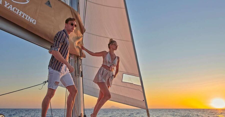 Santorini Gold Catamaran Cruise with Snorkel, BBQ & Open Bar - Red Beach starts the swimming