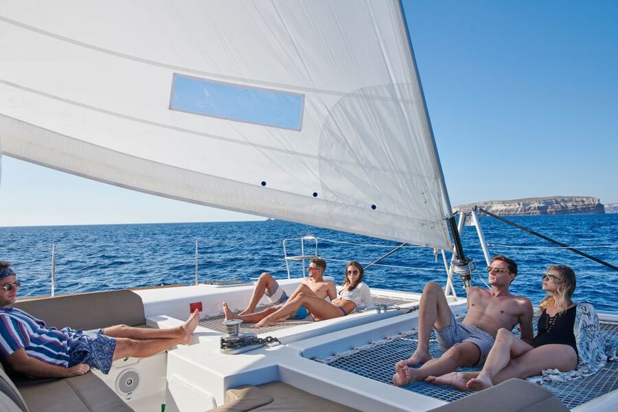 Santorini Gold Catamaran Cruise with Snorkel, BBQ & Open Bar - Sunset departures add real value